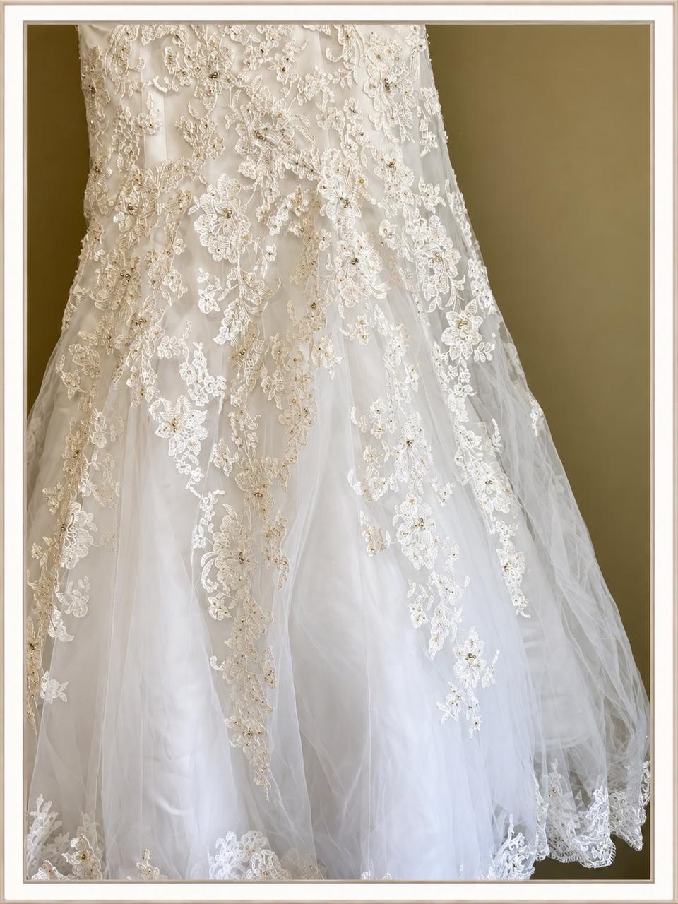 Wedding gown back zipper and button detail with pearl and crystal belt