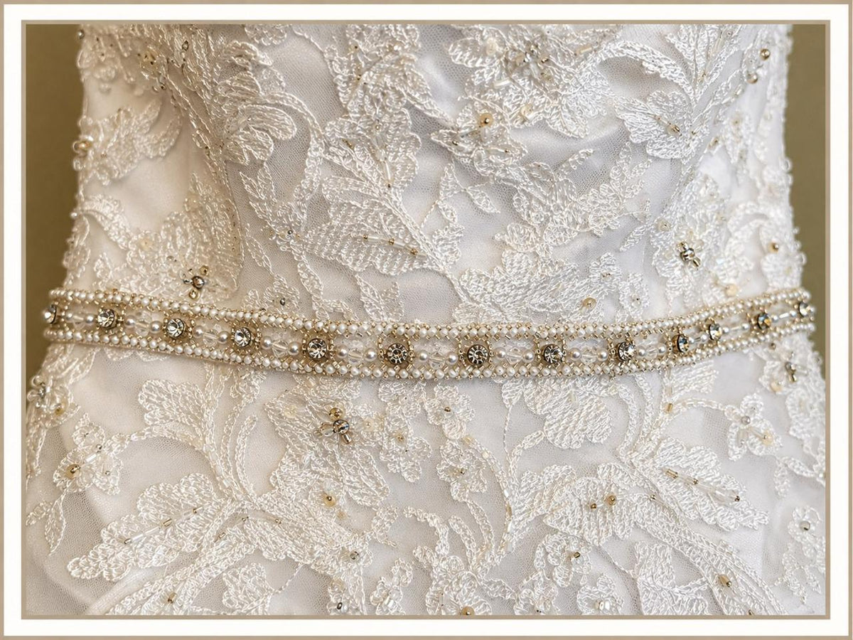 Wedding gown pearl and crystal waist belt close-up